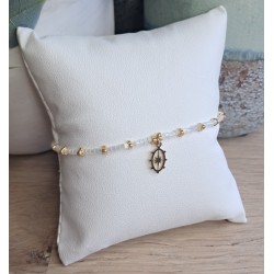 Bracelet fin blanc scintillant/doré avec breloque ovale étoile du nord