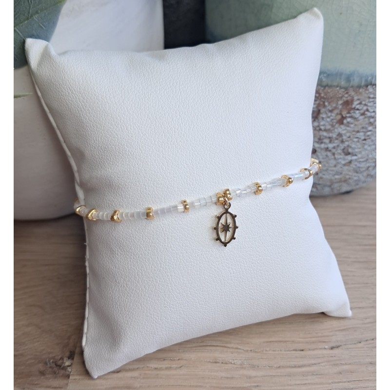 Bracelet fin blanc scintillant/doré avec breloque ovale étoile du nord
