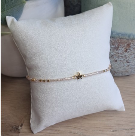 Bracelet fin rose pâle/doré avec breloque étoile