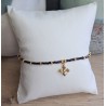 Bracelet fin noir irisé/doré avec breloque croix