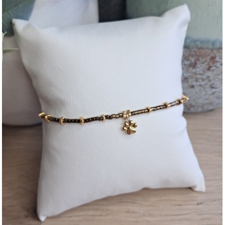Bracelet fin marron/doré avec breloque patte