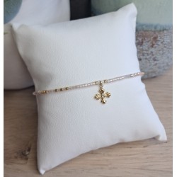 Bracelet fin rose pâle/doré avec breloque croix