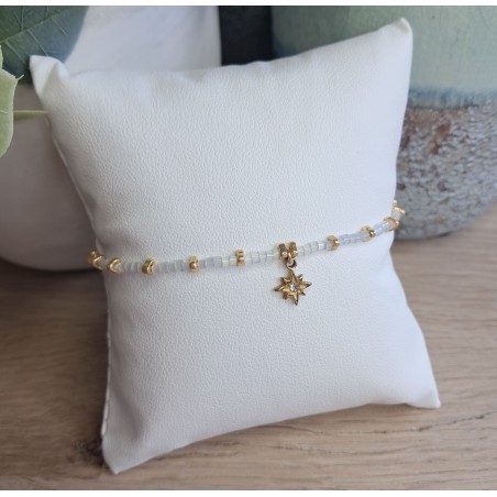 Bracelet fin blanc scintillant/doré avec breloque étoile du nord